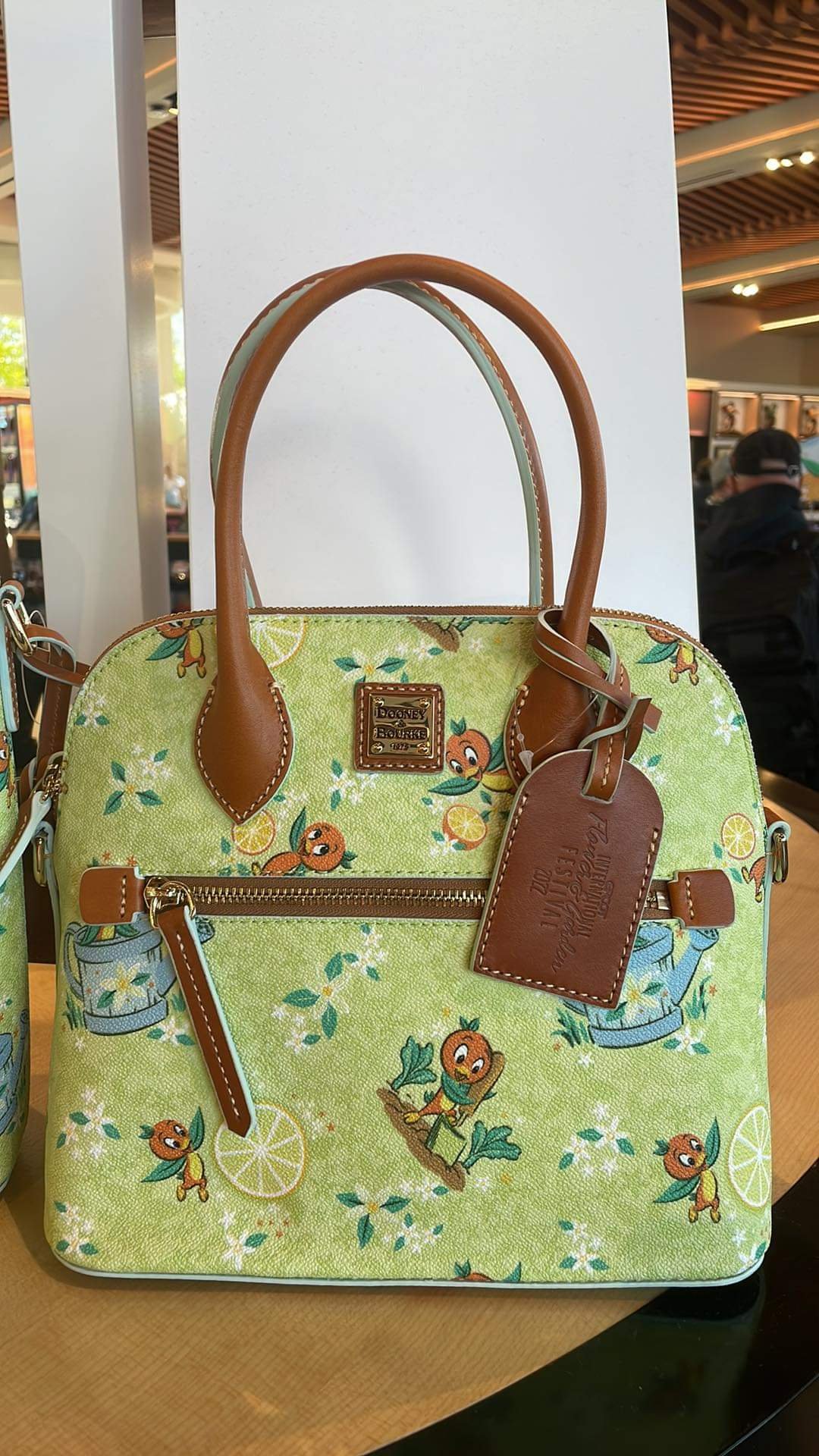 Orange Bird Dooney & Bourke Collection Squeezes Into Flower and Garden ...