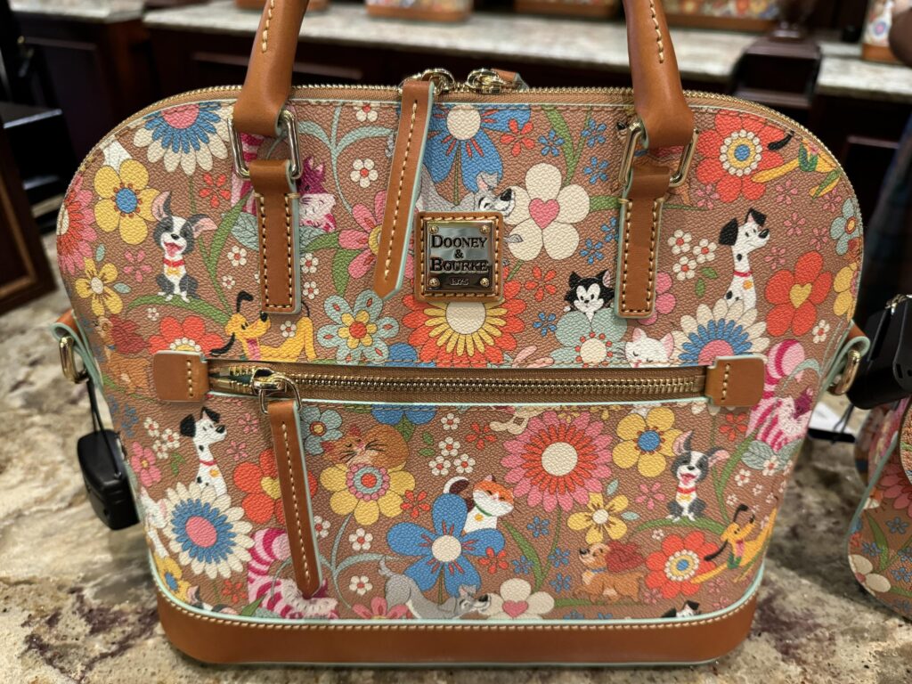 Take A Look At The Groovy Disney Pets Dooney & Bourke Collection! - bags