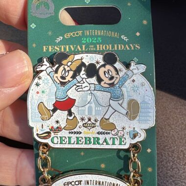 Colorful Disney holiday themed pin featuring Mickey and Minnie Mouse.