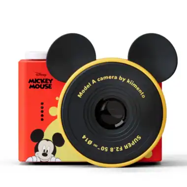 Bright yellow Mickey Mouse-inspired camera with black ears, perfect for Disney fans and collectors.