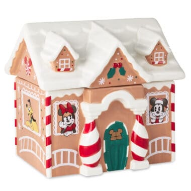 Cute Disney Christmas gingerbread house with Mickey Mouse, Minnie, and Pluto decorations.