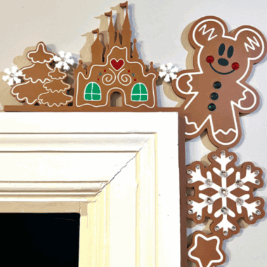 Colorful gingerbread and snowflake decorations for holiday wall decor.