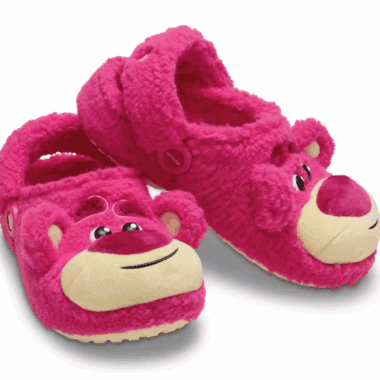 Cozy pink Disney teddy bear slippers with character face, perfect for Disney fans and comfortable home wear.