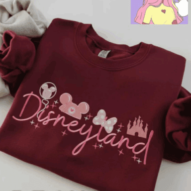 Disneyland adult hoodie featuring Disney princess prints and castle graphic, ideal for Disney fans.
