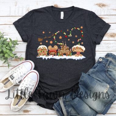 Cute Disney holiday graphic T-shirt with Christmas cookies and castle design.