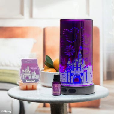 Decorative Disney-themed LED diffuser with castle and fireworks design.