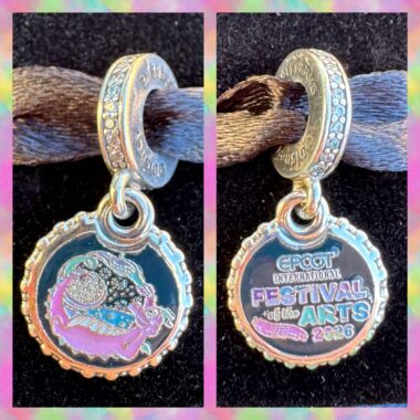 Sparkly Disney charm with Festival of the Arts 2026 logo, perfect for Disney fans.