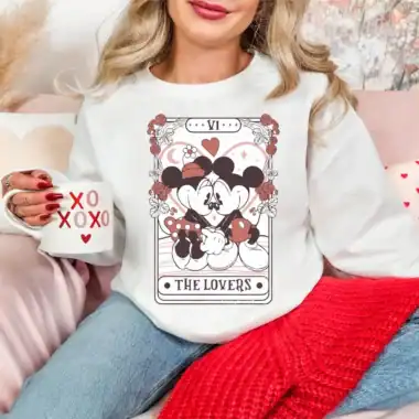 Mickey and Minnie Mouse illustrated as a tarot card, perfect for Disney lovers and fashionistas.