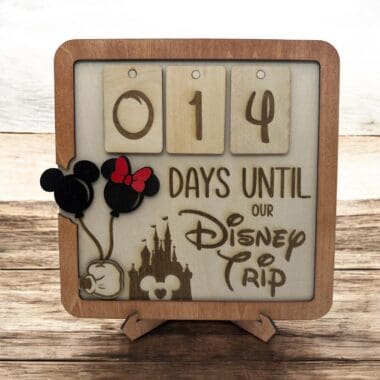 Decorative Disney countdown calendar featuring Mickey Mouse, Minnie Mouse, and a castle for Disney fans.