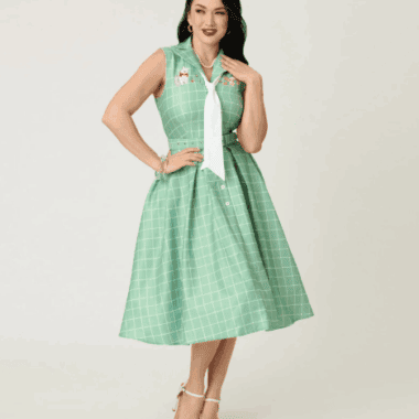 Inspired green checkered dress with Disney character embroidery, perfect for Disney fashion fans.
