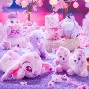 Colorful Sakura plush toys featuring Disney characters in spring-themed setting.