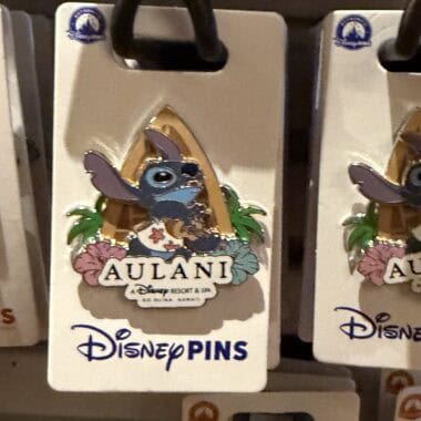 Disney Stitch Aulani Resort enamel pin with tropical design and colorful details.