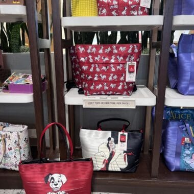 Red tote bag with white dog print, perfect for Disney fans and pet lovers.