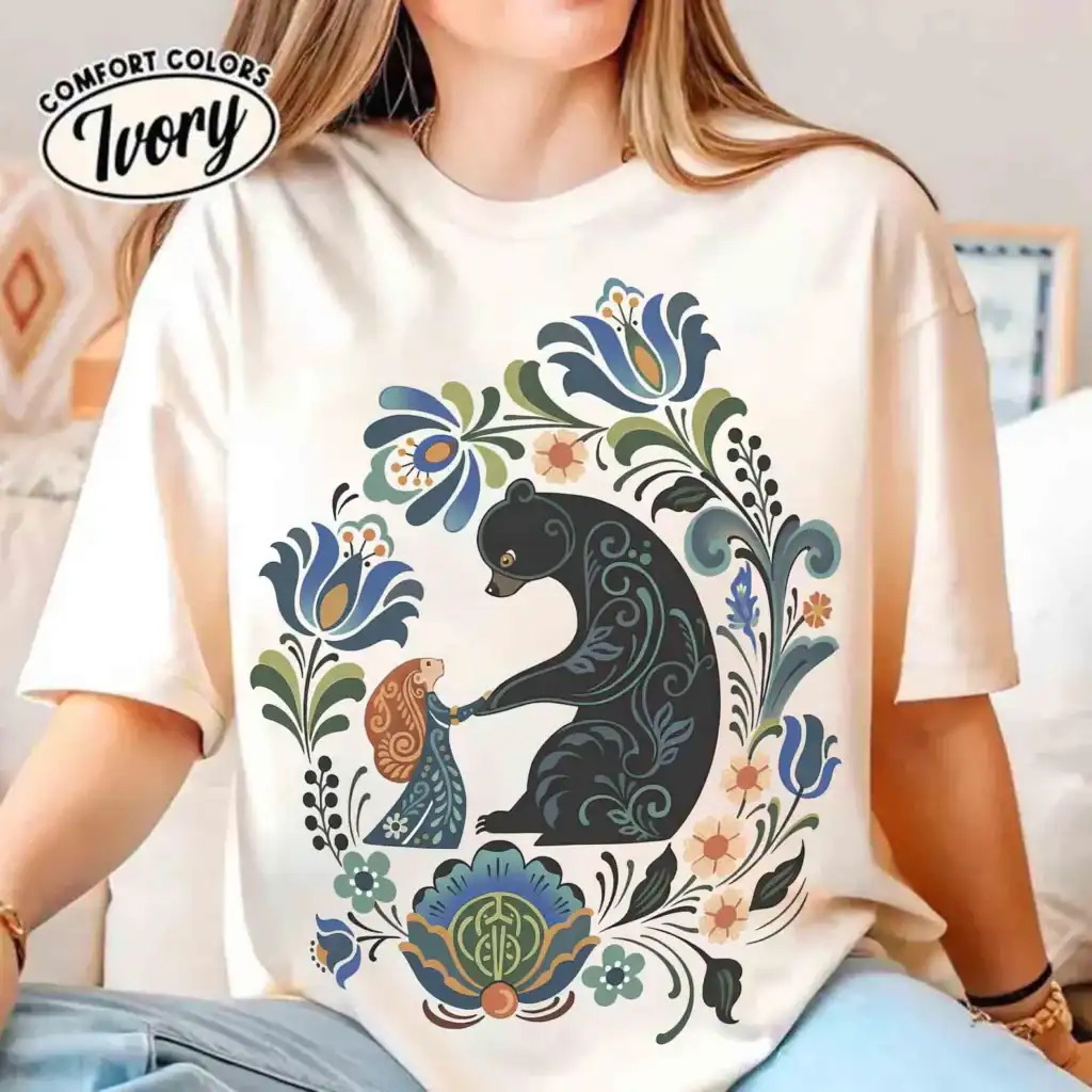 Comfort Colors Ivory T-shirt featuring Disney-inspired bear and floral pattern, perfect for Disney f.