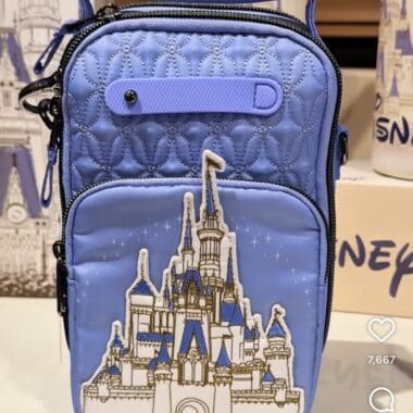 Blue Disney castle backpack with quilted design and front pocket.