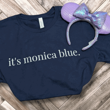 Disney Monica Blue T-Shirt with Minnie Mouse ears headband for fans.